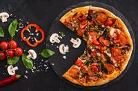 stock-photo-top-view-delicious-italian-pizza-vegetables-salami-black-background.jpg