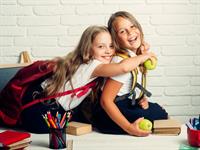 Shutterstock_1091976026_two girls in school_divas skolnieces.jpg